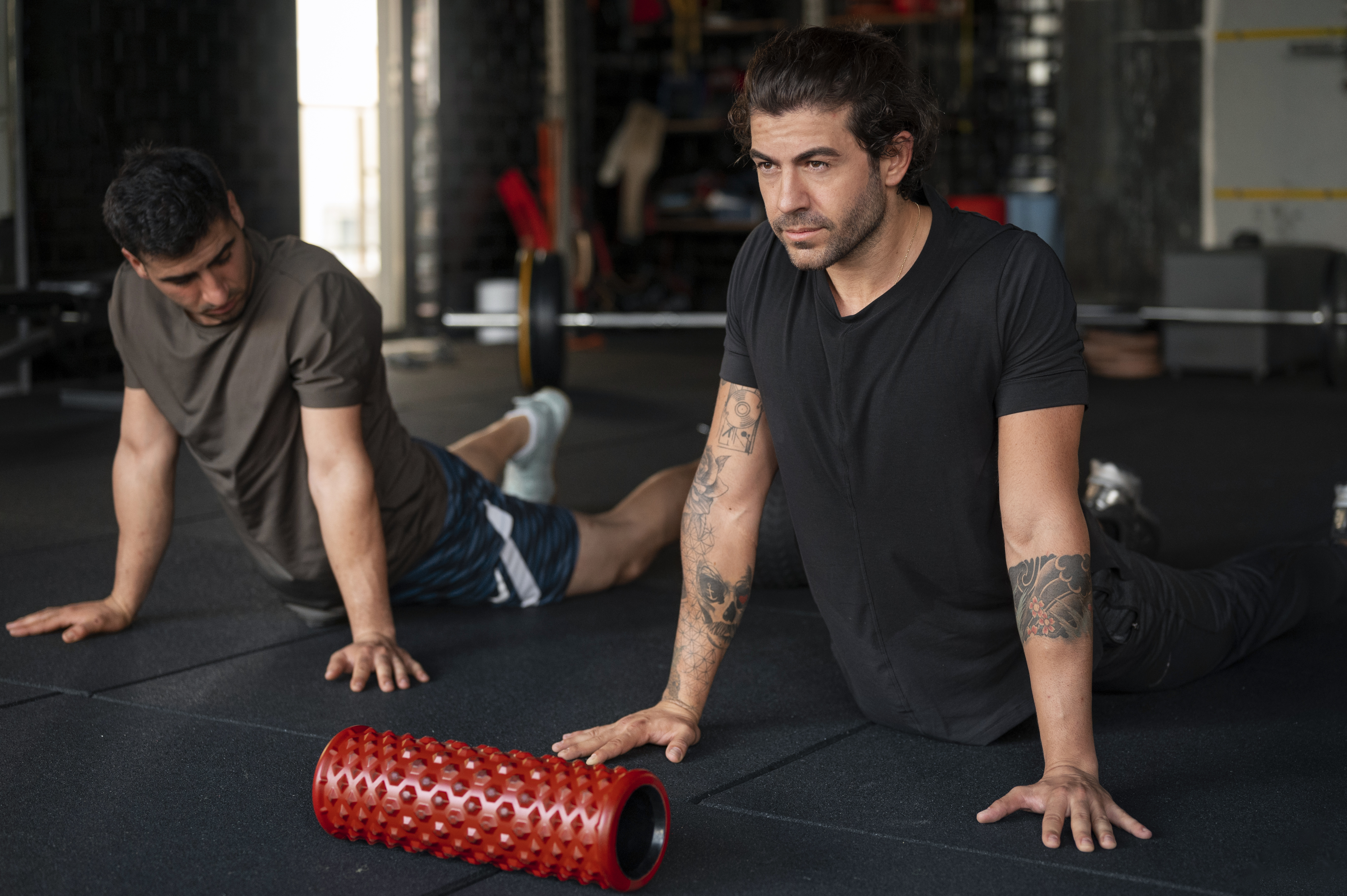 Athletes recovering and stretching